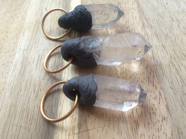 QUARTZ WITH SCULPTED BITS PENDANTS