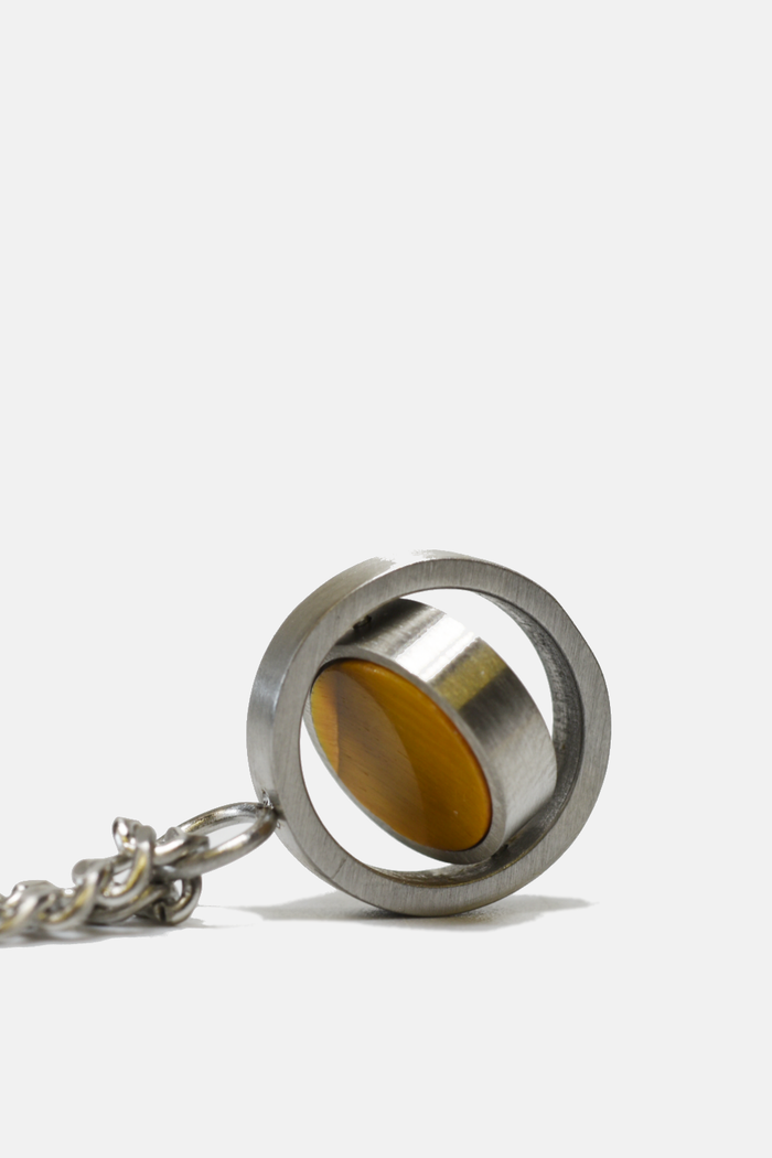 Reversible pendant necklace by Curated Basics featuring a sleek, versatile design with two different styles on each side.