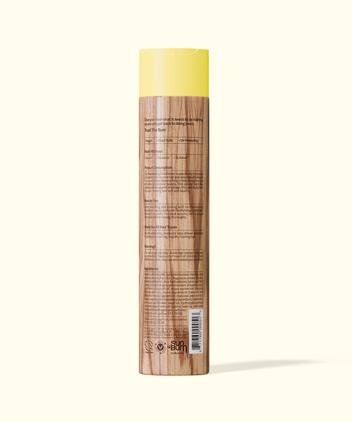 Hair product bottle with wooden design and yellow cap on a white background