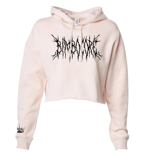 Bone cropped pullover on a white background. Metal Text in red "Bimbocore". Right sleeve has a crown in black around the wrist.