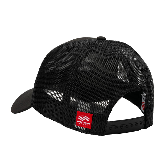 Black mesh trucker cap viewed from back, adjustable snapback and red brand tag