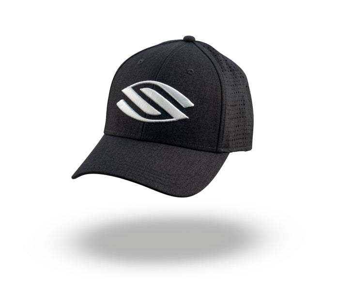 Black baseball cap with perforated mesh back and white embroidered abstract logo, shown floating with soft shadow