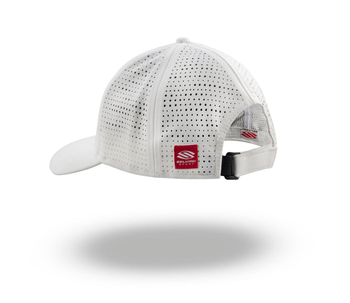White perforated mesh baseball cap (rear view) with adjustable strap and red brand tag showing a stylized 'S'.
