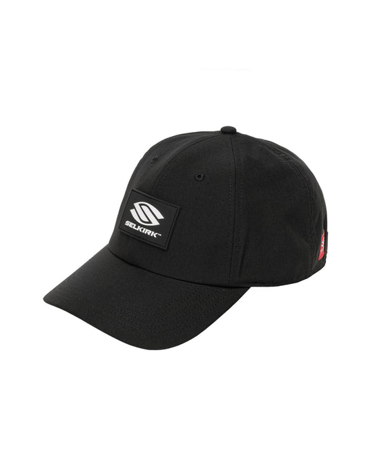 Black baseball cap with front patch reading SELKIRK™