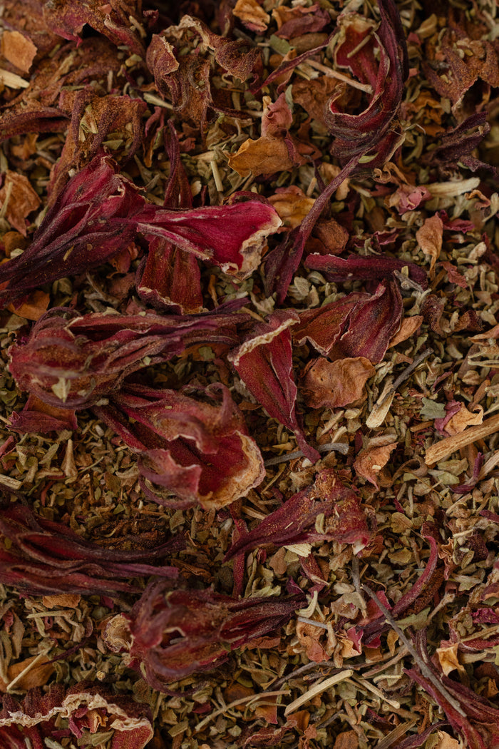 Close-up of dried herbs and flowers with a focus on texture and color.