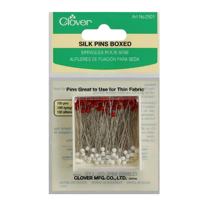 package of pins with red and white heads