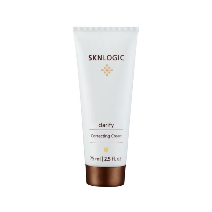 SKN014 SKNLOGIC Clarify Cream 75ml | A white squeeze tube of SKNLOGIC Clarify Correcting Cream with a metallic bronze cap, shown on a plain white background.