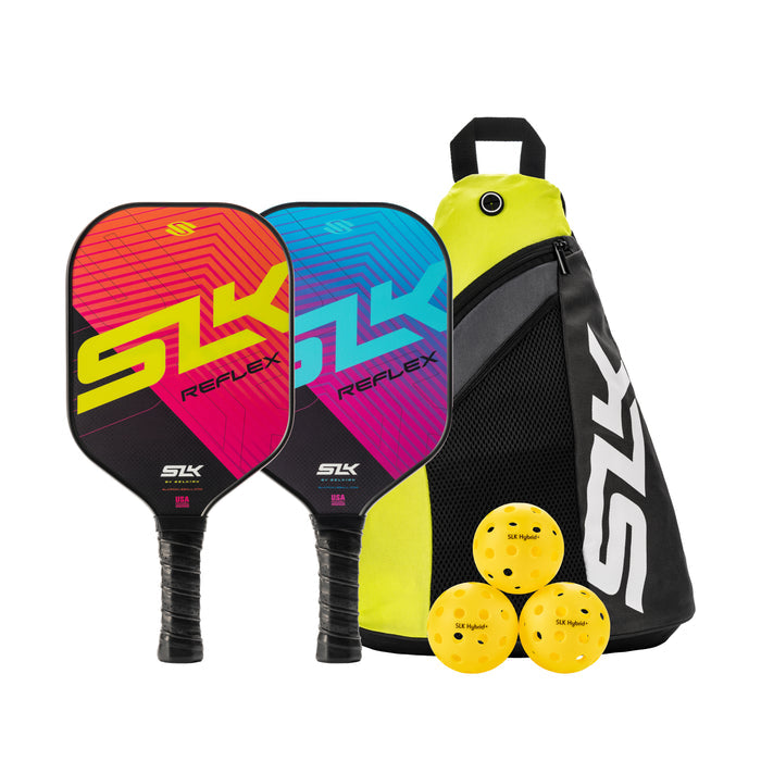 Two SLK REFLEX pickleball paddles, three yellow SLK Hybrid balls, and a black-and-yellow SLK carrying bag.
