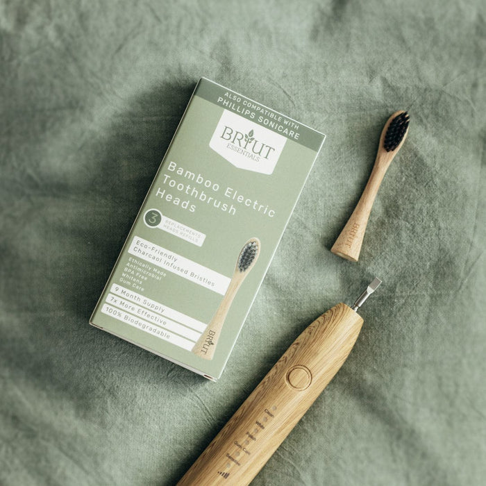 Sonicare-compatible bamboo replacement head close-up showing biodegradable bamboo body