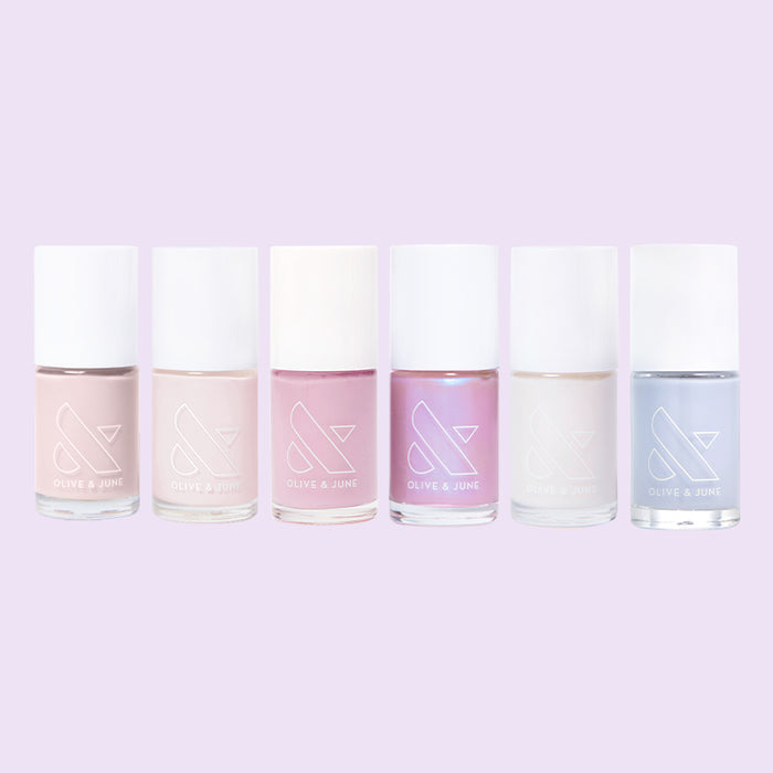 The Classic Mama Set featuring six neutral and soft pastel nail polishes for elegant at-home manicures