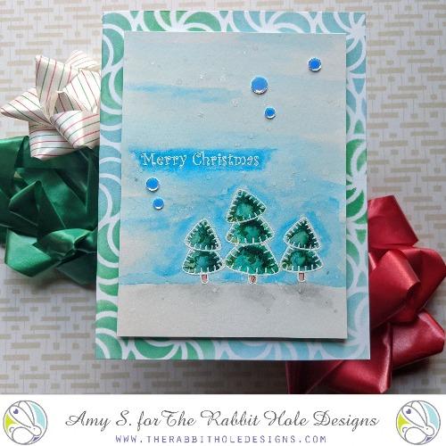 The Rabbit Hole Designs - Stamp Set - 4x4 - Kringle. Deeply etched, clear photopolymer stamps for precise placement. Made in the USA.  Coordinates with Kringle Dies. Available at Embellish Away located in Bowmanville Ontario Canada. Card design by Amy S.