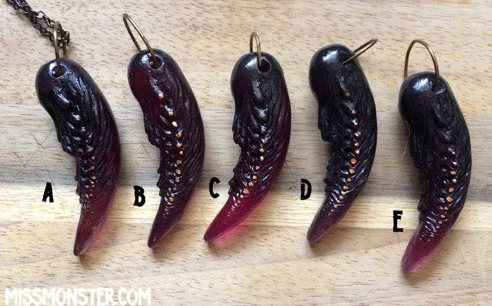 TUSK OF APOPHIS PENDANT- PURPLE