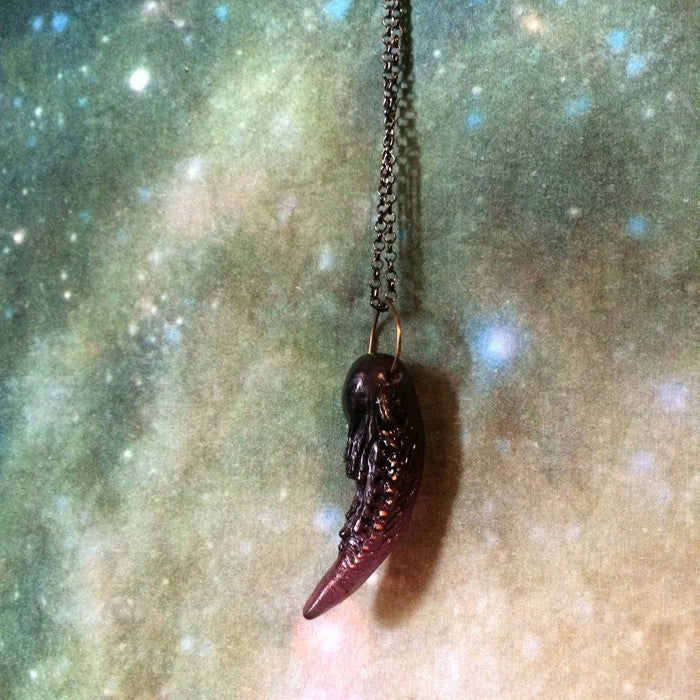 TUSK OF APOPHIS PENDANT- PURPLE