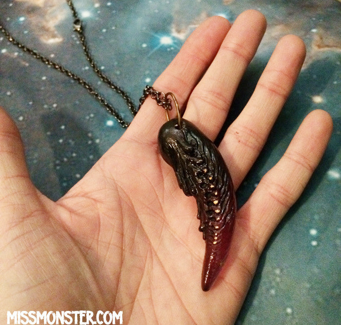TUSK OF APOPHIS PENDANT- PURPLE