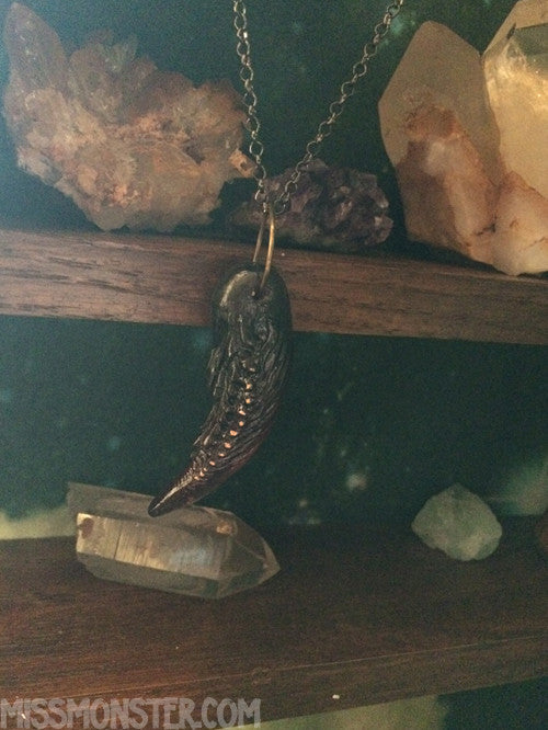 TUSK OF APOPHIS PENDANT- PURPLE