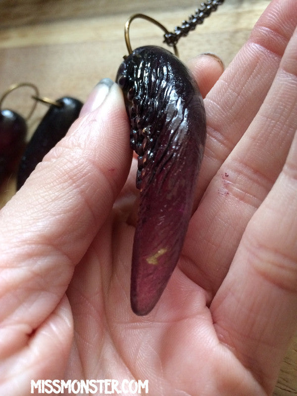 TUSK OF APOPHIS PENDANT- PURPLE