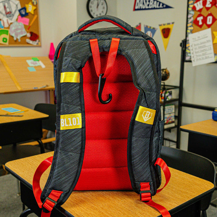 Adult model wearing multi-color backpack with "Unit 101 SZN 2" design