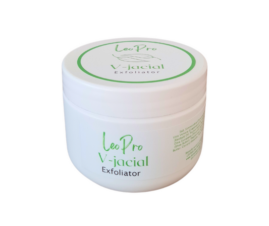 A white jar with a green lid labeled 'Leo Pro V-Jacial Exfoliator'.